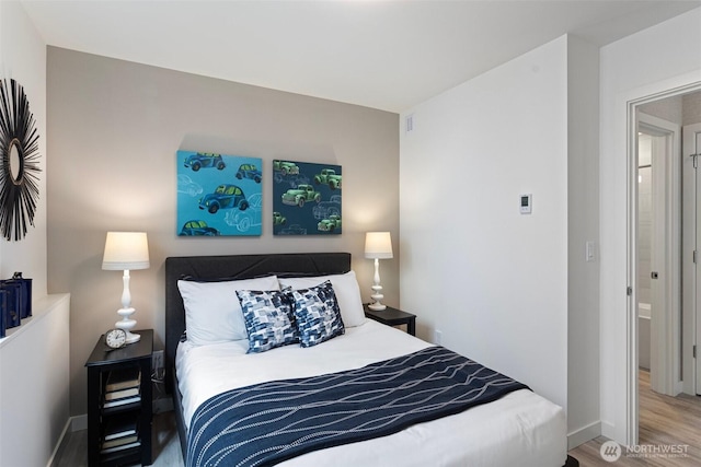2527 29th Ave S Unit A, Seattle, WA 98144 - bedroom with wood finished floors and baseboards