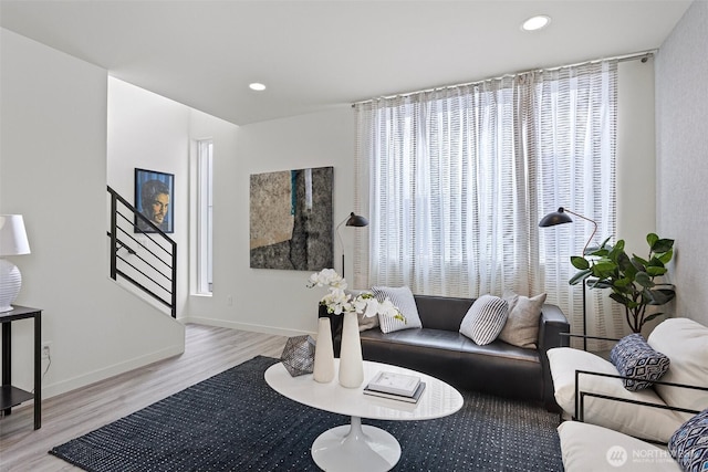 2527 29th Ave S Unit A, Seattle, WA 98144 - living area with wood finished floors, stairway, recessed lighting, and baseboards