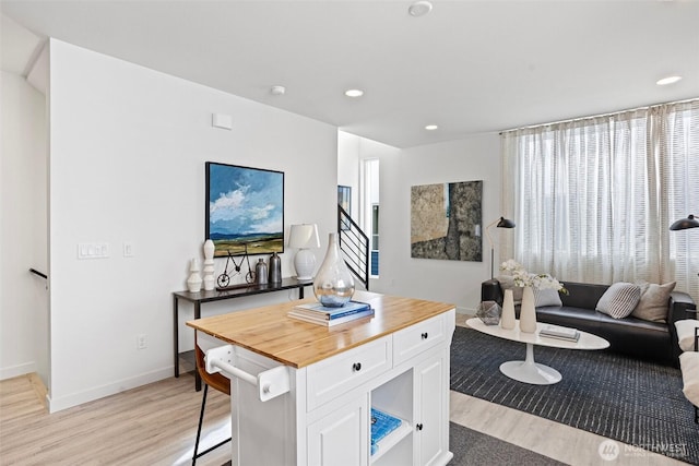 2527 29th Ave S Unit A, Seattle, WA 98144 - home office featuring light wood finished floors, baseboards, and recessed lighting