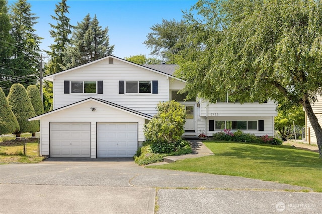 17122 40th Ave W, Lynnwood, WA 98037 - split level home with driveway and an attached garage