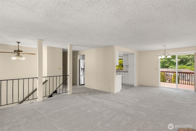 17122 40th Ave W, Lynnwood, WA 98037 - unfurnished room featuring a chandelier, light colored carpet, ceiling fan, and a textured ceiling