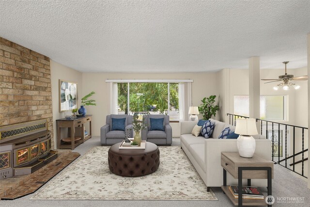 17122 40th Ave W, Lynnwood, WA 98037 - carpeted living room featuring a textured ceiling, ceiling fan, and a wood stove