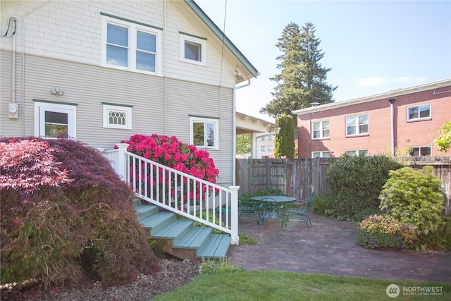 1510 Water St SW, Olympia, WA 98501 - view of property exterior featuring outdoor dining space and a patio area