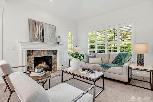 1122 140th Ave SE, Bellevue, WA 98005 - carpeted living area featuring a premium fireplace and baseboards