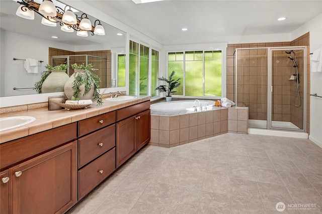 1122 140th Ave SE, Bellevue, WA 98005 - full bathroom featuring a bath, double vanity, a stall shower, tile patterned flooring, and recessed lighting