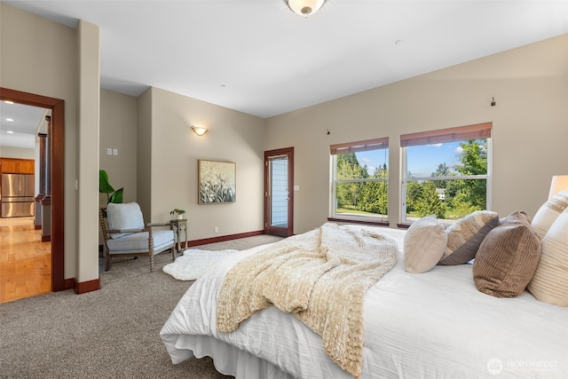 24022 SE 384th St, Enumclaw, WA 98022 - carpeted bedroom with stainless steel fridge and baseboards