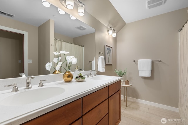 24022 SE 384th St, Enumclaw, WA 98022 - bathroom with double vanity, tile patterned flooring, baseboards, and curtained shower