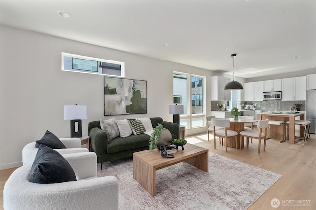 4521A Bagley Ave N, Seattle, WA 98103 - living room featuring light wood-style flooring and recessed lighting