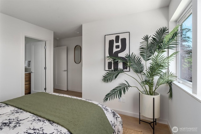 4521A Bagley Ave N, Seattle, WA 98103 - bedroom featuring wood finished floors and baseboards