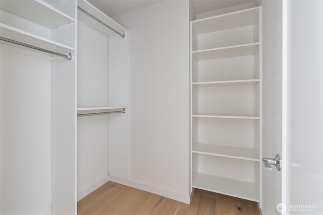 4521A Bagley Ave N, Seattle, WA 98103 - walk in closet with wood finished floors