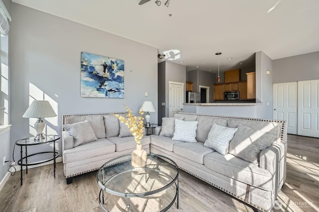 1855 Trossachs Blvd SE Unit 1404, Sammamish, WA 98075 - living room with light wood-style floors and baseboards