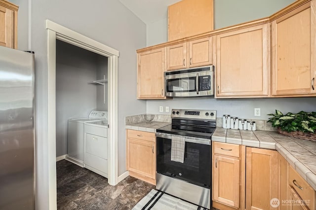 1855 Trossachs Blvd SE Unit 1404, Sammamish, WA 98075 - kitchen featuring stainless steel appliances, tile countertops, and light brown cabinetry