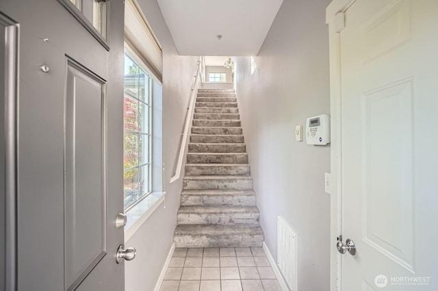 1855 Trossachs Blvd SE Unit 1404, Sammamish, WA 98075 - stairway with baseboards and tile patterned floors