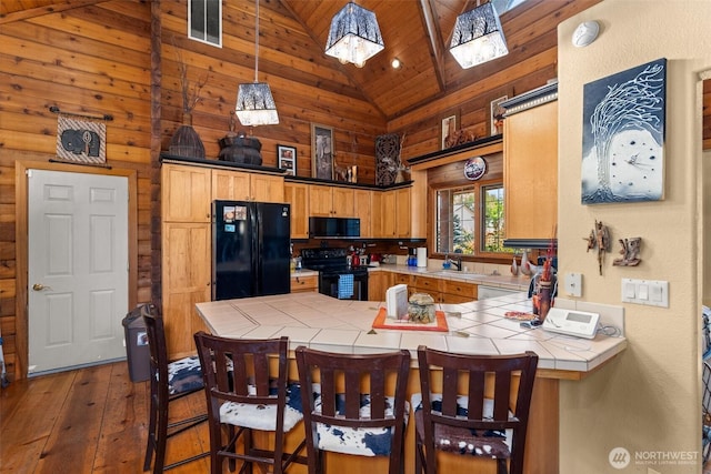505 SW 19th St, Chehalis, WA 98532 - kitchen with black appliances, tile counters, high vaulted ceiling, wood ceiling, and a peninsula