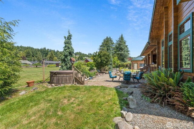 505 SW 19th St, Chehalis, WA 98532 - view of grassy yard featuring a hot tub and a patio