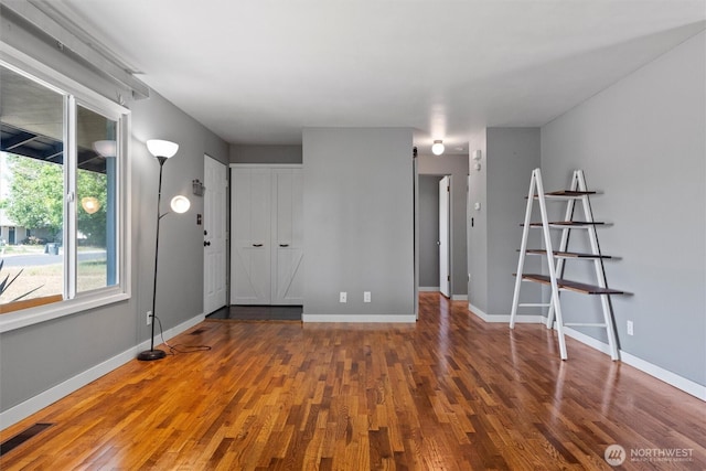 1115 S Evergreen Dr, Moses Lake, WA 98837 - spare room with wood finished floors and baseboards