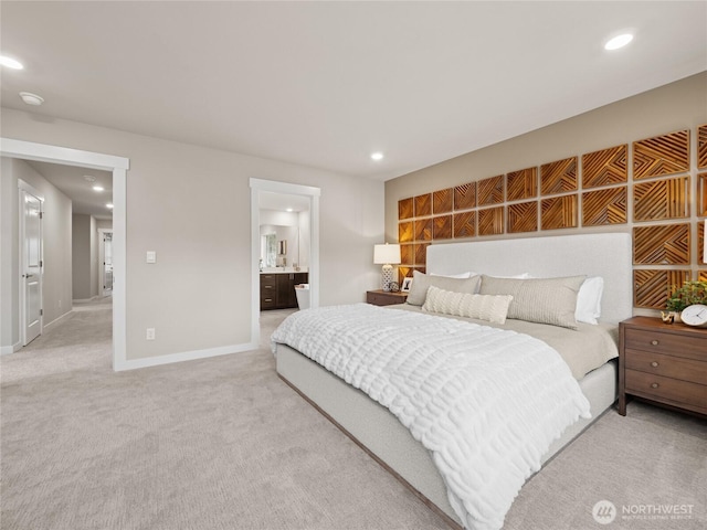 11532 SE 83rd Pl Unit 7, Newcastle, WA 98056 - bedroom featuring recessed lighting, light colored carpet, baseboards, and ensuite bathroom
