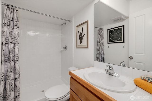 1824 23rd Ave Unit B, Seattle, WA 98122 - bathroom with vanity, toilet, and a tile shower