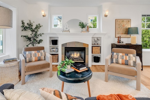 1824 23rd Ave Unit B, Seattle, WA 98122 - living room featuring wood finished floors and a fireplace