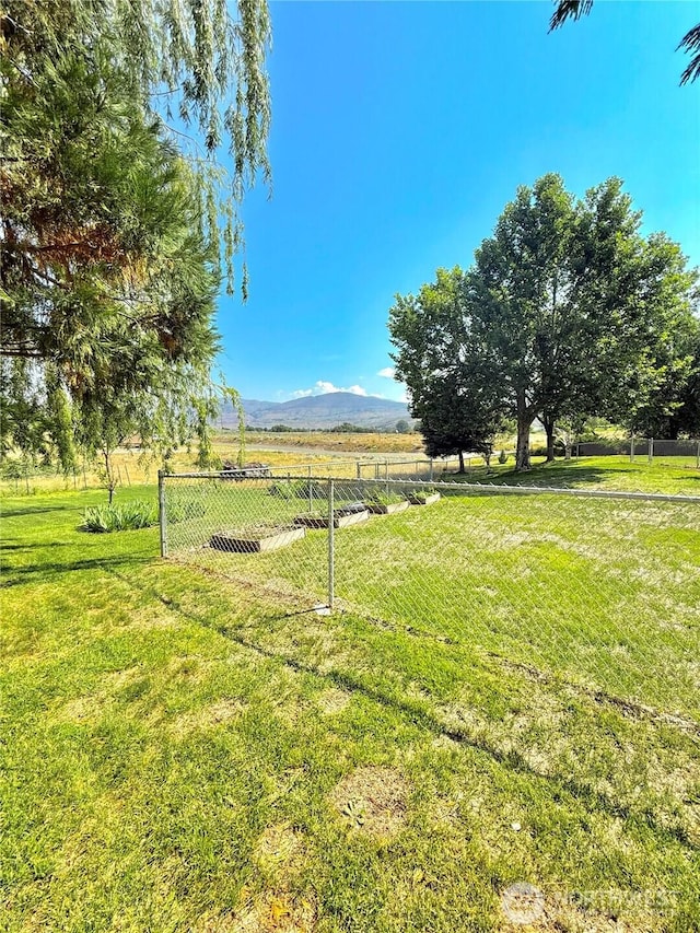 47 Kruse St, Omak, WA 98841 - view of yard featuring a view of countryside and a mountain view
