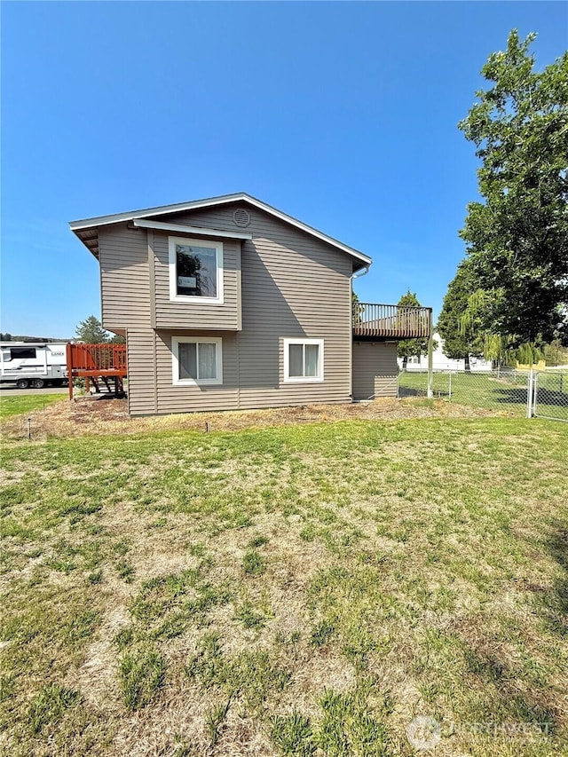 47 Kruse St, Omak, WA 98841 - rear view of property with a deck