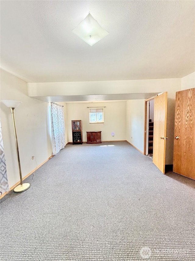 47 Kruse St, Omak, WA 98841 - spare room with carpet floors and a textured ceiling