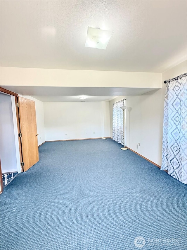 47 Kruse St, Omak, WA 98841 - finished basement featuring carpet and a textured ceiling