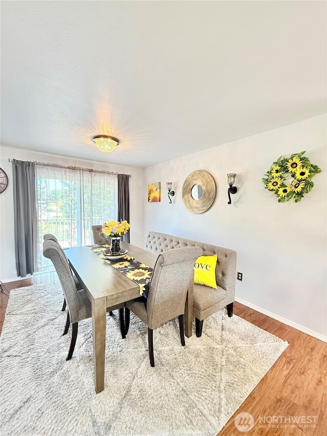 47 Kruse St, Omak, WA 98841 - dining room featuring wood finished floors and baseboards