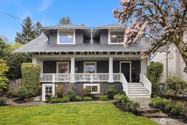 1611 Mcgilvra Blvd E, Seattle, WA 98112 - view of front of property with covered porch, stairway, a shingled roof, and a front yard