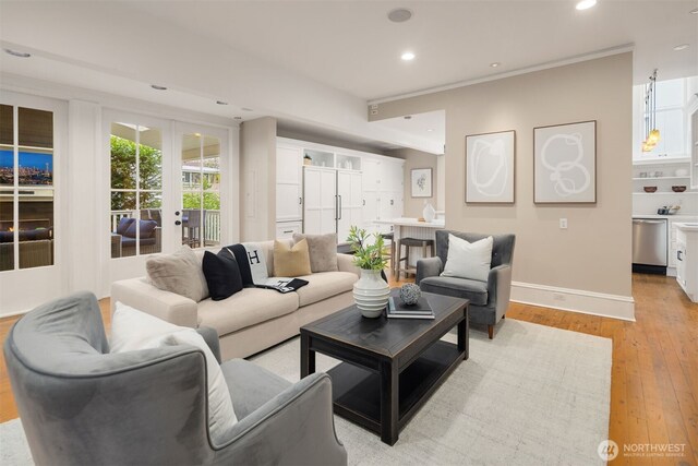 1611 Mcgilvra Blvd E, Seattle, WA 98112 - living area with french doors, light wood-style flooring, recessed lighting, baseboards, and ornamental molding