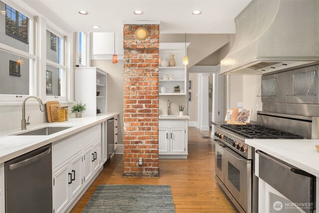 1611 Mcgilvra Blvd E, Seattle, WA 98112 - kitchen with stainless steel appliances, a sink, premium range hood, open shelves, and light wood-type flooring