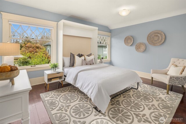 1611 Mcgilvra Blvd E, Seattle, WA 98112 - bedroom with multiple windows, baseboards, and wood finished floors