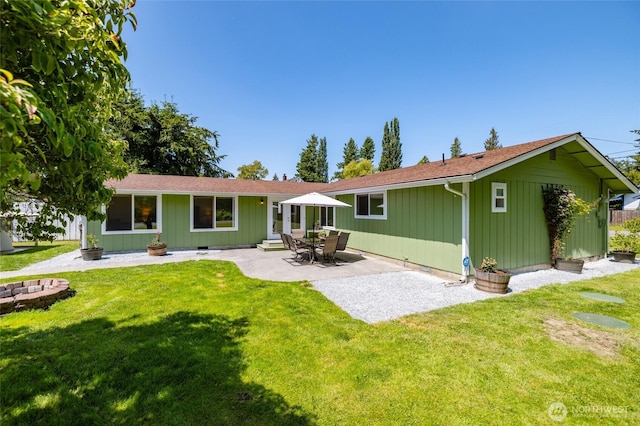 23696 Lake Dr, Mount Vernon, WA 98273 - rear view of property featuring a yard and a patio area