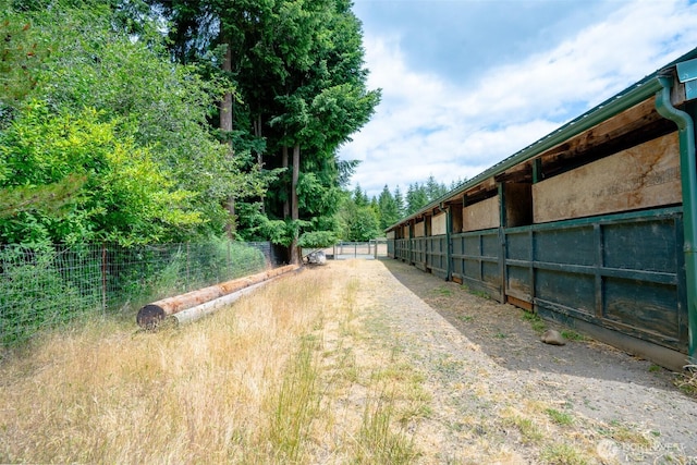 14938 Frenchie Ln SE, Yelm, WA 98597 - view of yard featuring an exterior structure and an outdoor structure