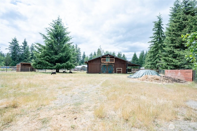 14938 Frenchie Ln SE, Yelm, WA 98597 - view of yard with an outdoor structure