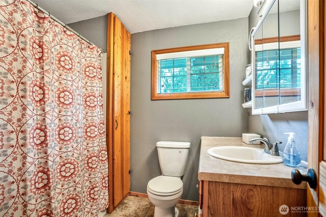 14938 Frenchie Ln SE, Yelm, WA 98597 - full bathroom with vanity and curtained shower