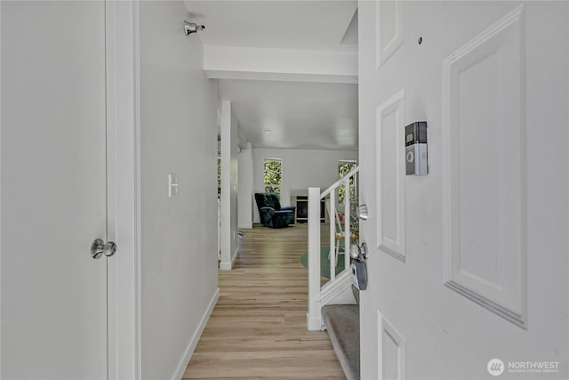 3939 10th St SE Unit A2, Puyallup, WA 98374 - hall with light wood-style flooring, baseboards, and stairs