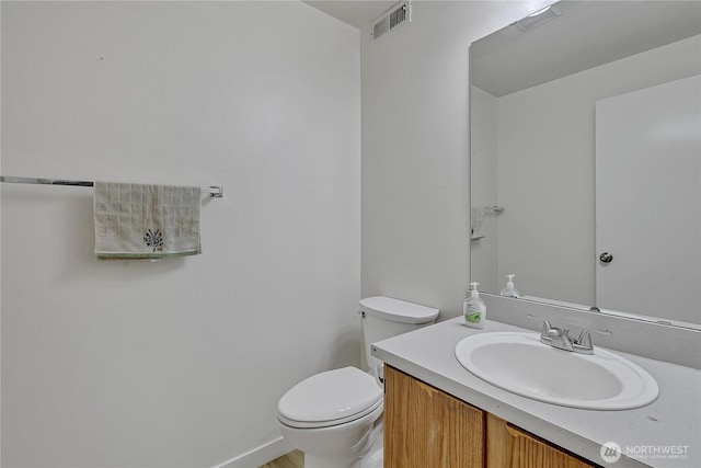 3939 10th St SE Unit A2, Puyallup, WA 98374 - half bathroom featuring vanity and toilet