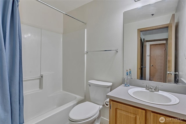 3939 10th St SE Unit A2, Puyallup, WA 98374 - bathroom featuring shower / tub combo with curtain, toilet, and vanity