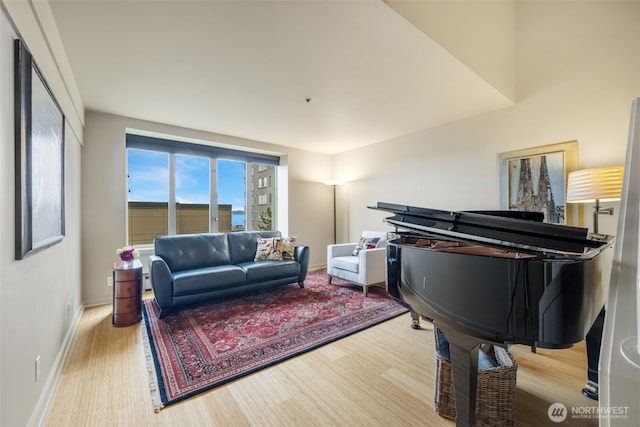 98 Union St Unit 301, Seattle, WA 98101 - living area featuring wood finished floors and baseboards
