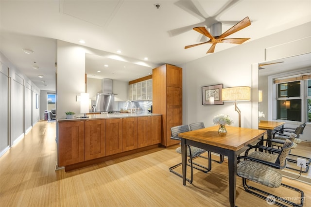 98 Union St Unit 301, Seattle, WA 98101 - dining space featuring light wood-style floors, a ceiling fan, and recessed lighting