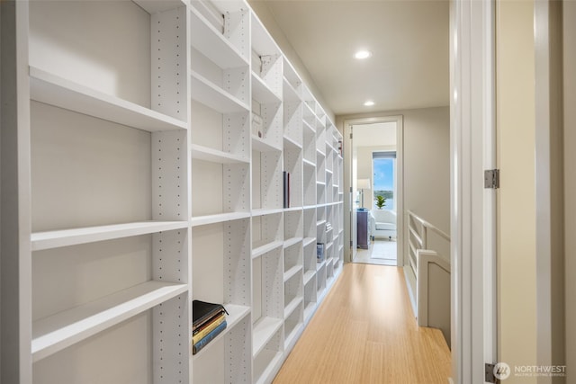 98 Union St Unit 301, Seattle, WA 98101 - hall with light wood-style flooring and recessed lighting