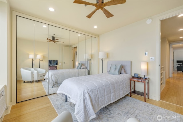98 Union St Unit 301, Seattle, WA 98101 - bedroom featuring a closet, light wood-style flooring, recessed lighting, and a ceiling fan