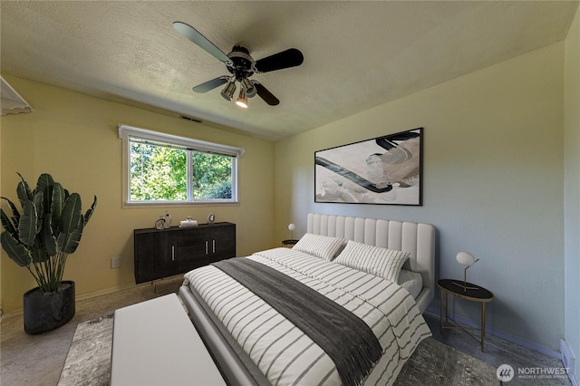 5611 128th Pl SE, Everett, WA 98208 - bedroom with baseboards, a ceiling fan, and a textured ceiling