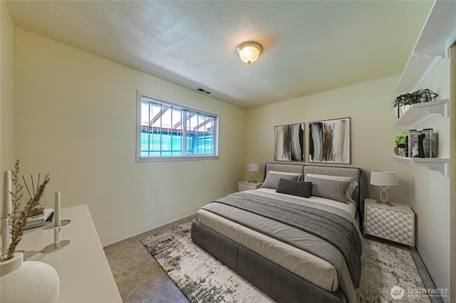5611 128th Pl SE, Everett, WA 98208 - bedroom featuring baseboards, a textured ceiling, and carpet floors