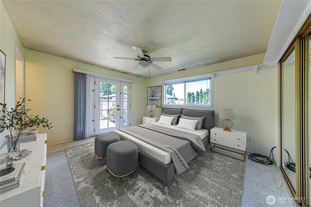5611 128th Pl SE, Everett, WA 98208 - bedroom with access to outside, carpet, a textured ceiling, french doors, and ceiling fan
