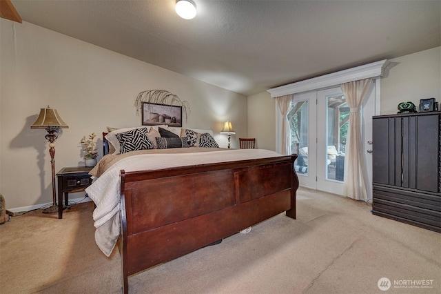1510 E Benson Lake Dr, Grapeview, WA 98546 - bedroom with light colored carpet and access to outside