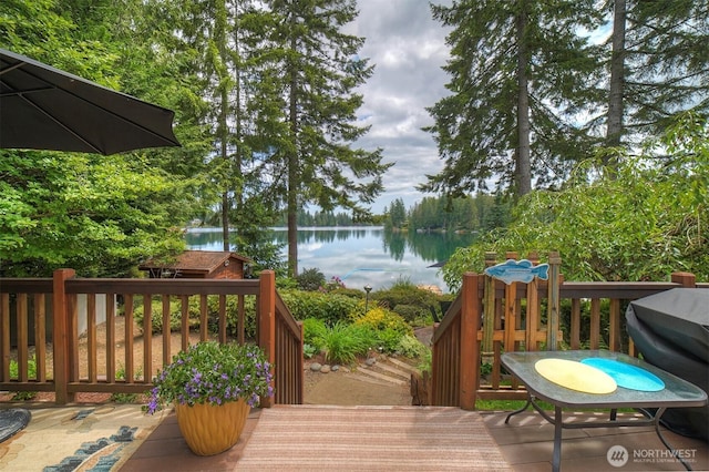 1510 E Benson Lake Dr, Grapeview, WA 98546 - deck featuring a water view and area for grilling