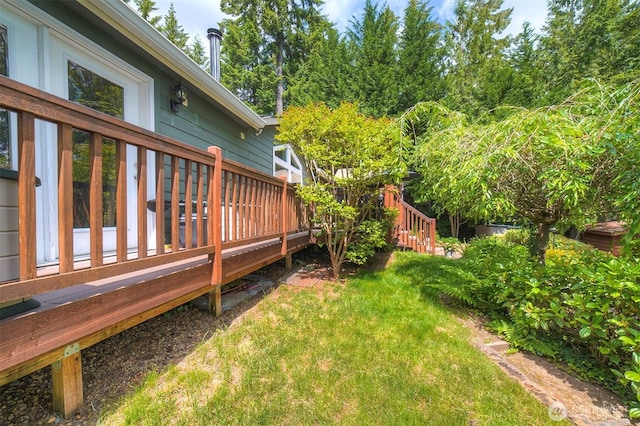 1510 E Benson Lake Dr, Grapeview, WA 98546 - view of green lawn with a deck