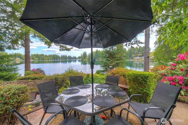 1510 E Benson Lake Dr, Grapeview, WA 98546 - view of patio with a water view and outdoor dining space